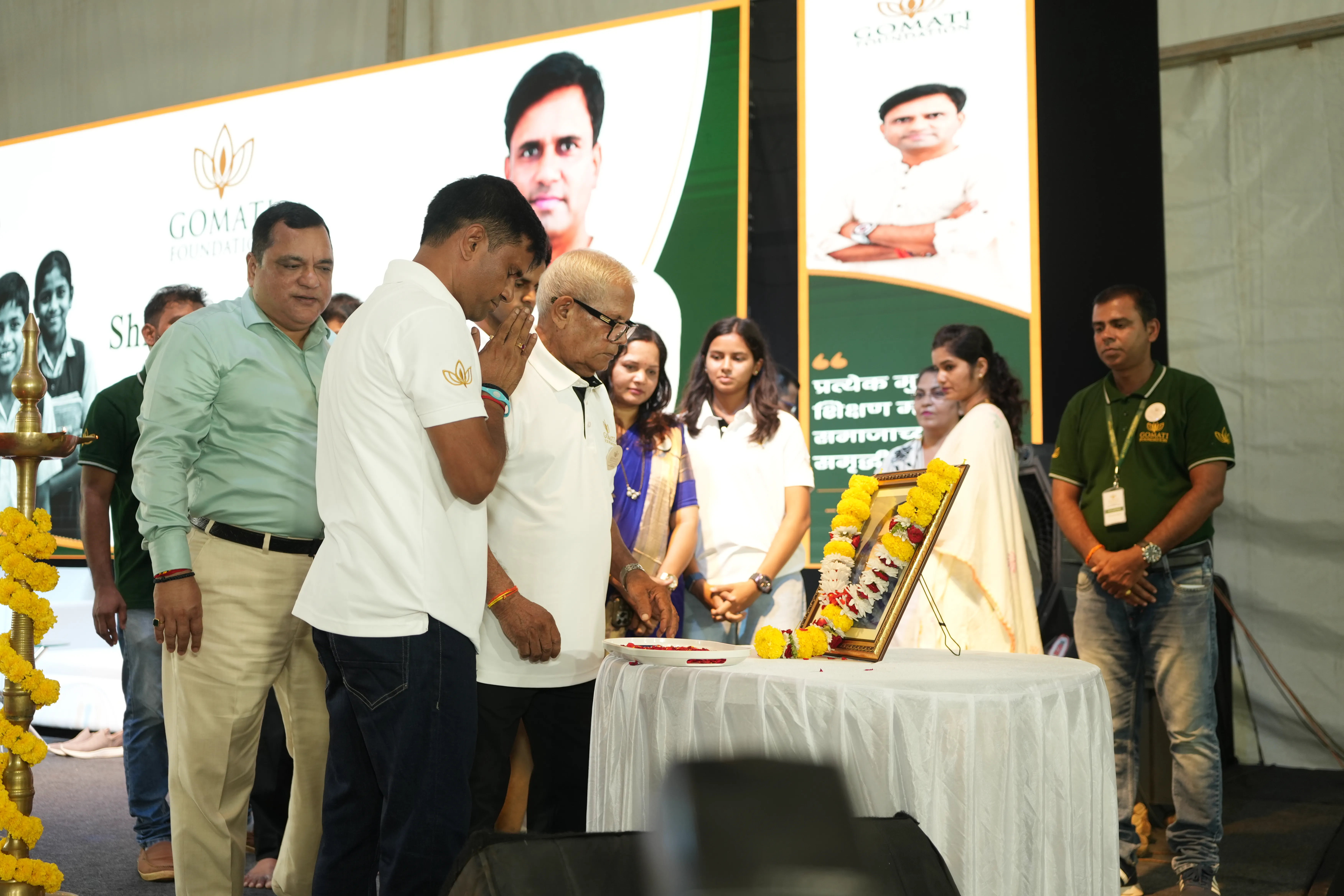 gomati-foundation-leaders-paying-tribute-during-educational-and-community-development-event